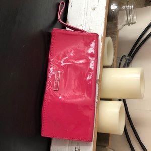 Cole Haan pink patent wristlet